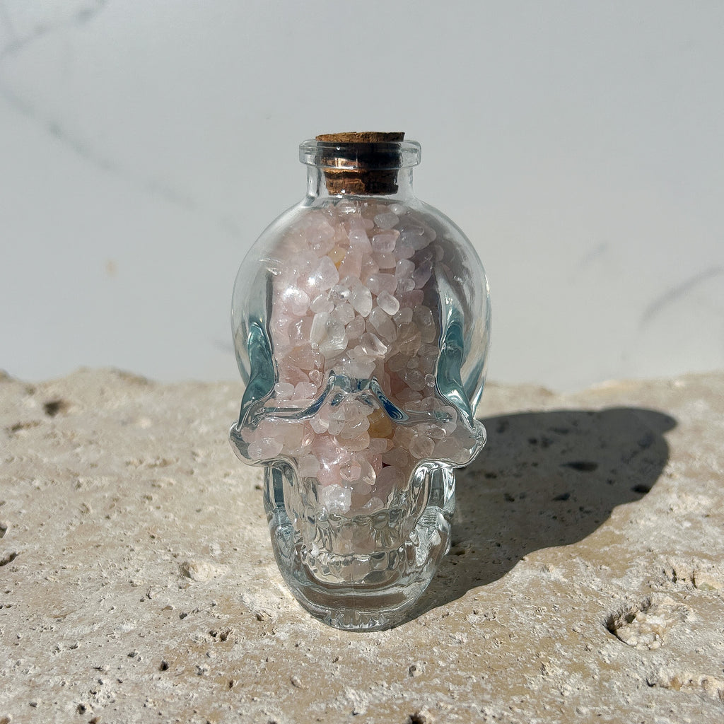 Clear Glass Skull with Rose Quartz Crystal Chips