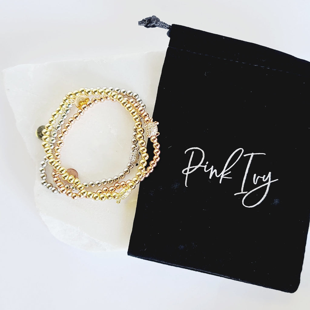 Gold Crystal Turtle Beaded Stretch Charm Bracelet By Pink Ivy