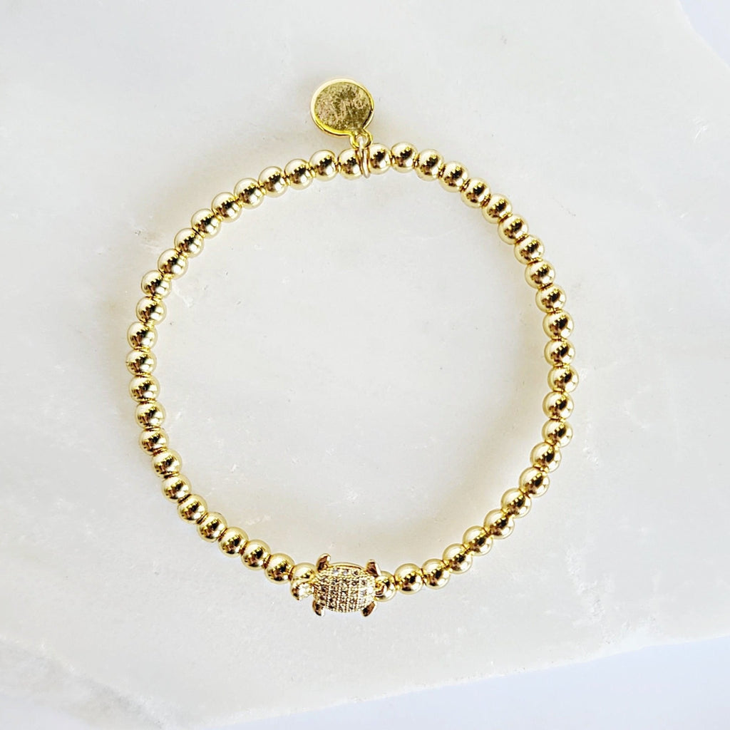 Gold Crystal Turtle Beaded Stretch Charm Bracelet By Pink Ivy